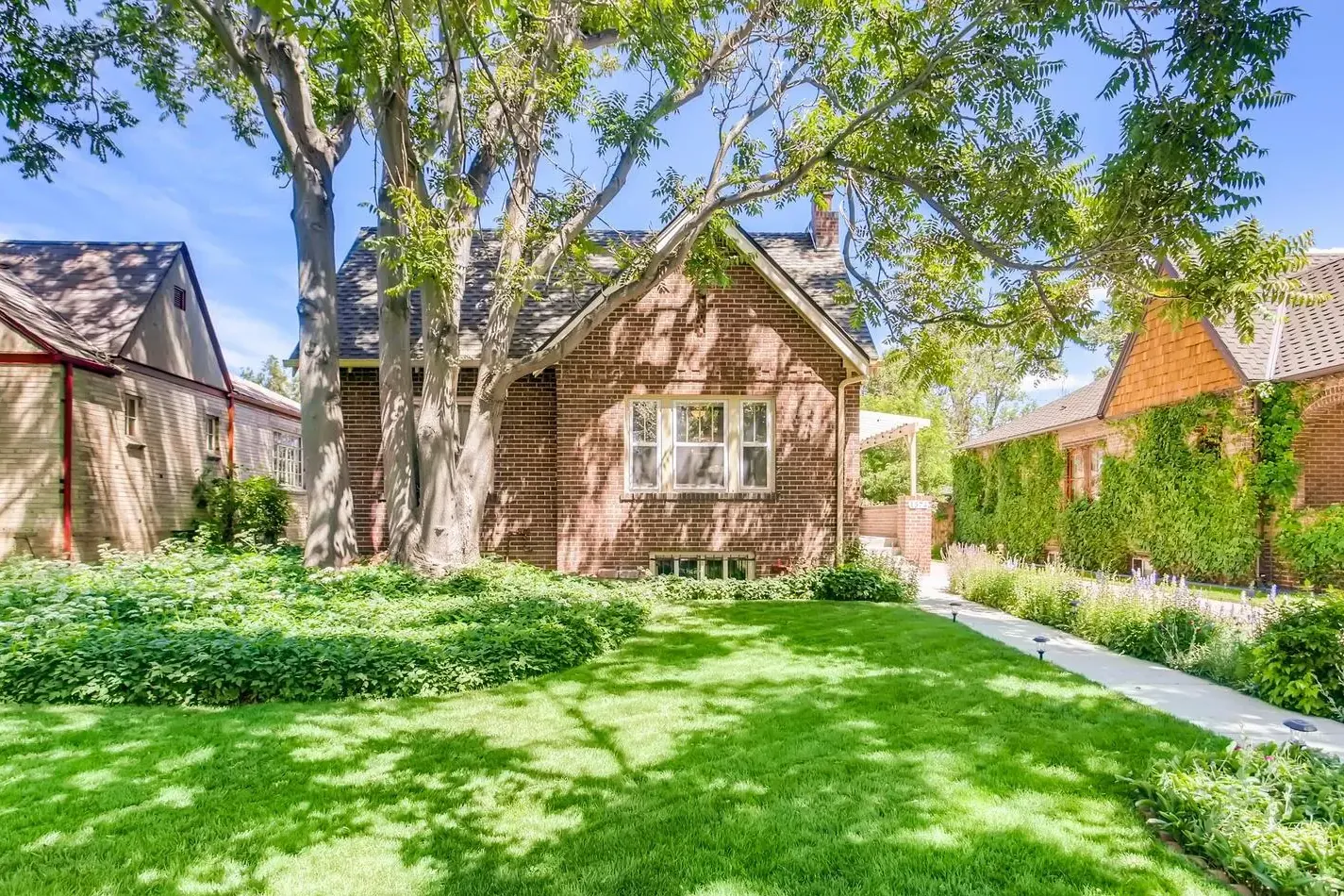 A brick Tudor at 1574 Hudson Street in South Park Hill, one of our past sales