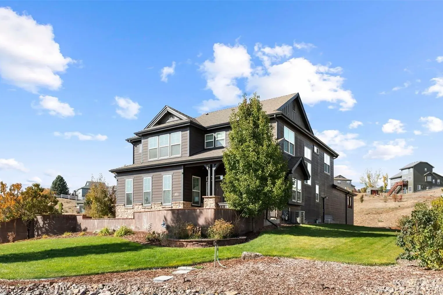 A two-story home on a large lot at 15001 Lansing Street in Todd Creek, one of our past sales